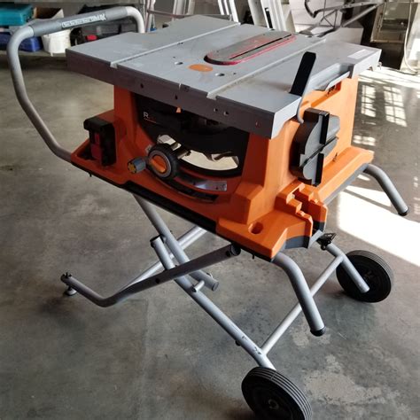 RIDGID TABLE SAW ON FOLDING ROLLING STAND