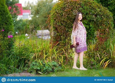 Girl in a Summer Scarf on Her Shoulders Barefoot on Grass Stock Photo - Image of bear, lifestyle ...