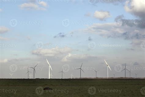 wind turbines and blue sky with clouds 1242546 Stock Photo at Vecteezy