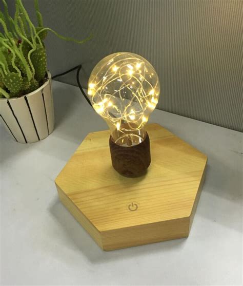 new 360 rotating wooden base magnetic floating levitating led bulb lamp ...