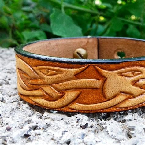 Celtic dragon leather bracelet Leather carving Knot work | Etsy ...