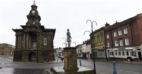 32 photographs showing the deserted streets of Burslem during the UK ...