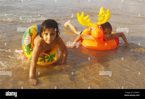 Palestinians enjoy a day at the beach in Gaza City on June 24, 2011. Photo by Ashraf Amra Stock ...