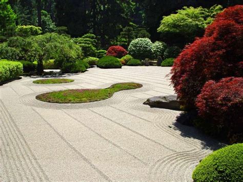 The Japanese sand garden has gravel beds raked into ripple patterns of ...