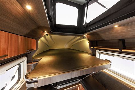 Toyota Hilux Gets Morphed Into an Off-Grid-Ready Motorhome With a Pop-Up Roof and Two Beds ...