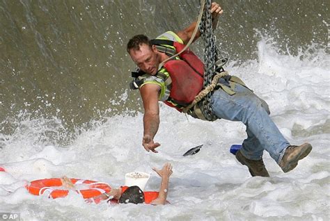 ' Construction worker saves woman trapped in swirling river' - amazing ...