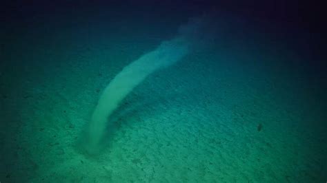 See a wild underwater tornado whirl across the sea floor | Sea floor ...