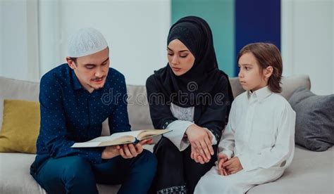 Happy Muslim Family Enjoying the Holy Month of Ramadan while Praying ...