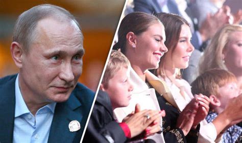 Putin's 'lover' Alina Kabaeva pictured with children wearing wedding ...