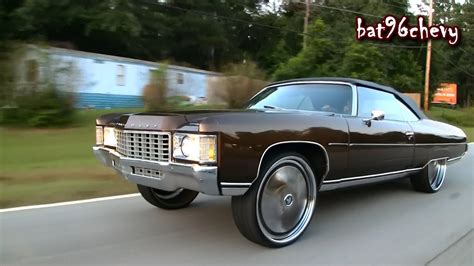 Brown 1971 Chevy Impala Donk Vert on 26" DUB Dirago Staggered Spinners - 1080p HD - YouTube