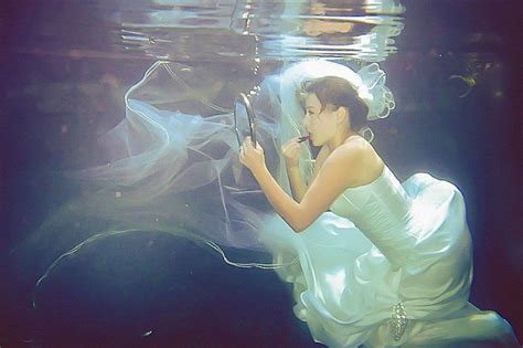 What to Do With Your Dress After Your Wedding | Underwater wedding, Wedding, Wedding dresses photos