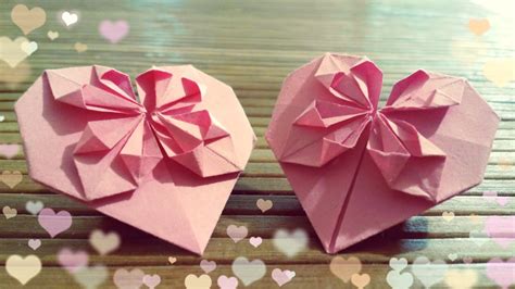 How to make origami heart with a flower. Heart with a flower made of paper. Origami for ...