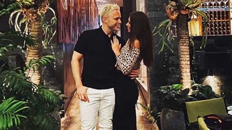 Olly Murs and stunning girlfriend Amelia Tank pose for rare photo after playing hilarious pranks ...