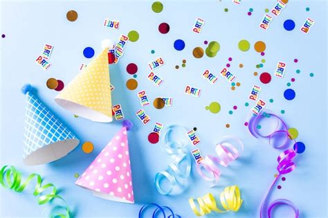 Premium Photo | Colorful party hats for kids Birthday Party on blue ...