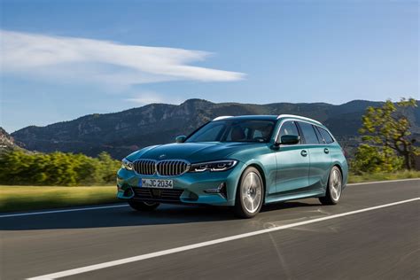 New BMW 3 Series Touring debuts with more space, less weight | DriveMag ...