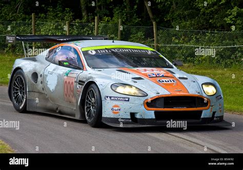 2008 Aston Martin DBR9 GT1 "Le Mans" racer with driver Antonio Garcia at Goodwood Festival of ...