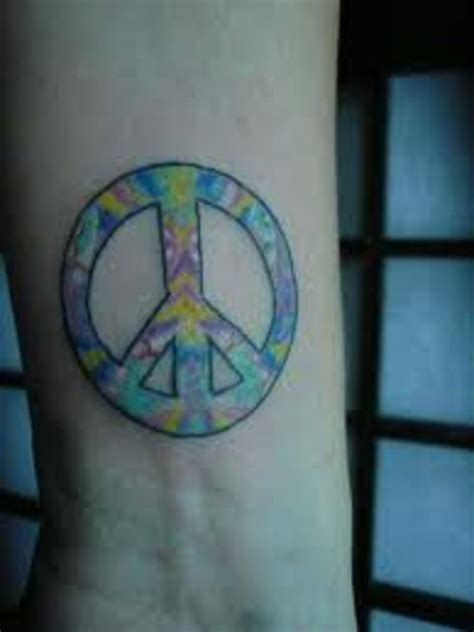 Peace Sign Tattoo And Peace Sign Tattoo Meanings-Peace Sign Tattoo ...