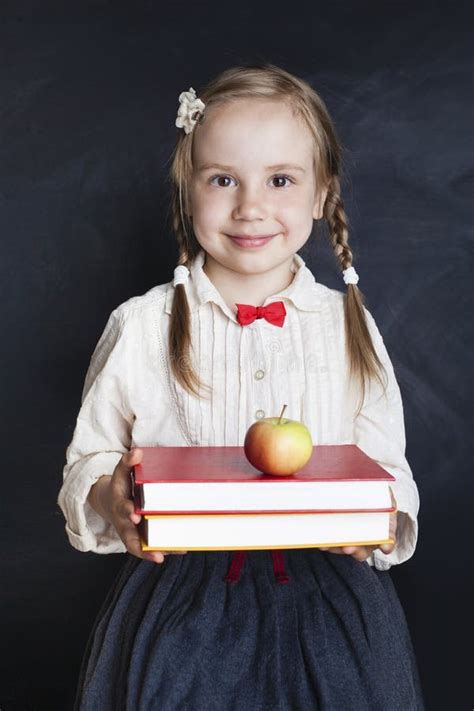 Happy Child Girl in School Uniform Stock Photo - Image of schoolbook, manual: 122197798