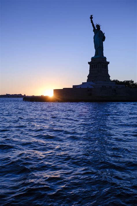 Statue of liberty during sunset - StockFreedom - Premium Stock Photography