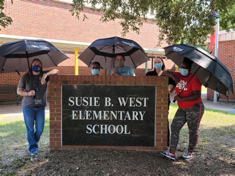 West Elementary School Car Rider Team will stay dry during bus duty | Natchez-Adams School District