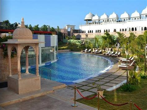 A gorgeous pool...a spectacular poolside and a lovely time at Radisson Blu Udaipur Palace Resort ...