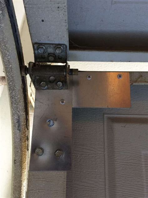 How To Repair a Garage Door Hinge - Learn Garage Doors