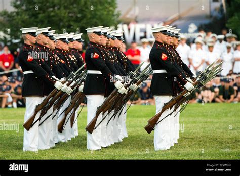 The US Marine Corps Silent Drill Platoon performs their drills during ...