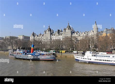 The Tattershall Castle boat and The Royal Horseguards Hotel on the Thames at Westminster, London ...