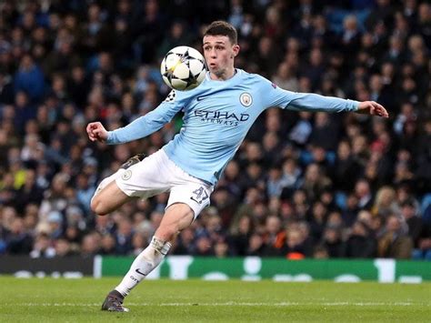 Watch a bare-chested Phil Foden show his skills on the streets of ...