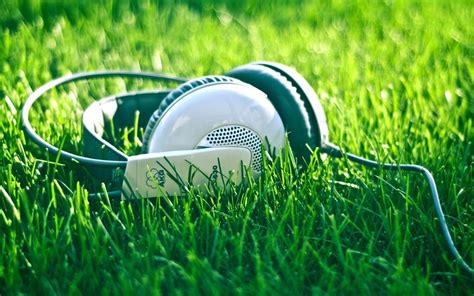 headphones in the grass-music theme Desktop Wallpaper Preview ...