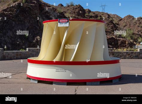 A turbine water wheel on display beside Parker Dam and the Colorado ...