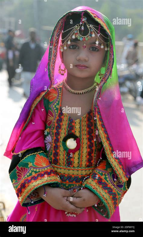 Hyderabad, Pakistan. 06th Dec, 2020. Children in Sindhi traditional dresses take part in the ...