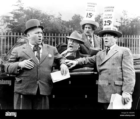 The Three Stooges, (Curly Howard, Larry Fine, Moe Howard), Vernon Dent, (in car), ca. early ...