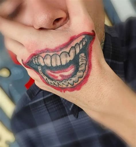 Share more than 80 laughing joker hand tattoo super hot - in.coedo.com.vn