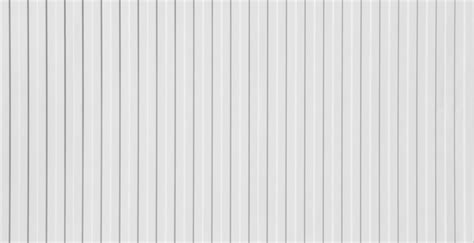 Premium Photo | Corrugated empty grey fence made from steel sheet