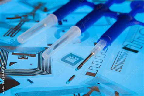 RFID implantation syringes and RFID tags Stock Photo | Adobe Stock