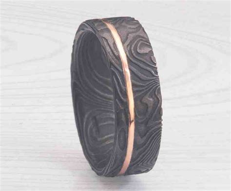 ALL BLACK DAMASCUS STEEL RING $1059 to $1809 – James Binnion Metal Arts