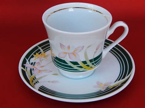 Vintage Porcelain Coffee Cup And Saucer With Floral Design Stock Photo ...