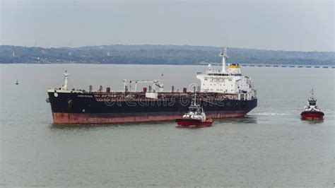 Tugboat and Tanker Ship Maneuver in Tanjung Perak Port Area on August 2022 Editorial Photography ...