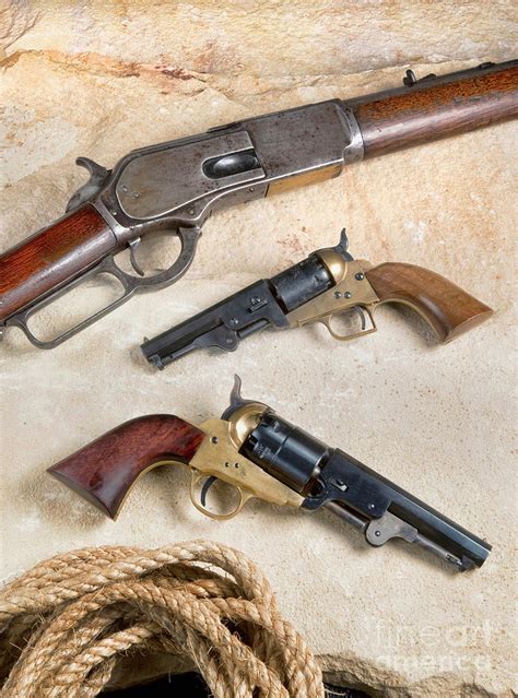 Old Cowboy Guns. Photograph by W Scott McGill - Pixels