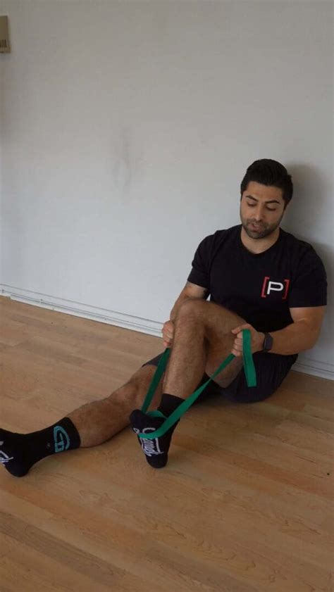 Seated Soleus Stretch With Strap - [P]rehab