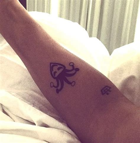 Justin Bieber Gets a Jester Tattoo as House-Egging Charges Loom ...