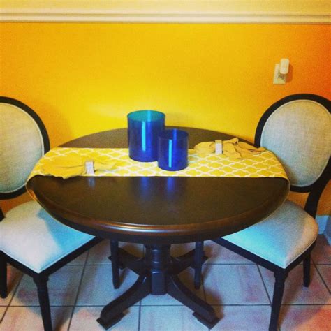 Mustard yellow eat-in. Pop of cobalt. Black and brown and linen pieces playing well together ...