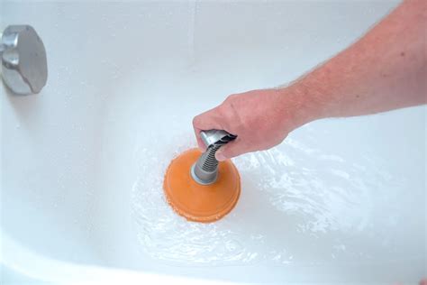 How To Unclog A Bathtub Drain With A Plunger? | Storables