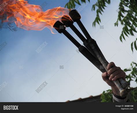 Holding Flame Image & Photo (Free Trial) | Bigstock