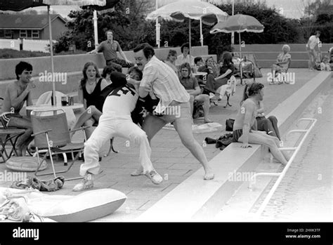 Robin Askwith and cast filming 'Confessions from a holiday camp' on ...