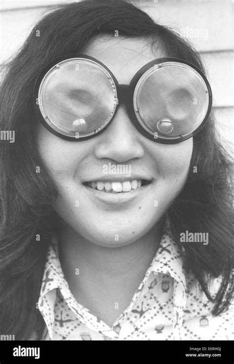 Tokyo, Japan. 20th Mar, 1970. A woman models funky glasses made of ...