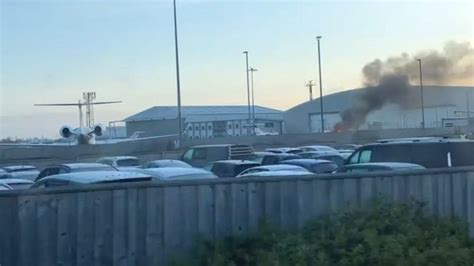 Car catches fire at Bristol Airport - BBC News