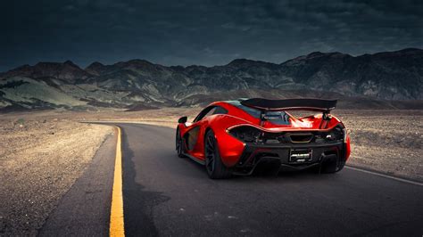 McLaren P1 going through the mountains Wallpaper Download 3840x2160