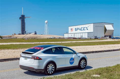 Astronauts to ride NASA-adorned Tesla Model X to SpaceX launchpad | collectSPACE